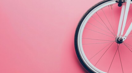Photo of, Pink background with minimalist bicycle wheel motifs for design, banner template