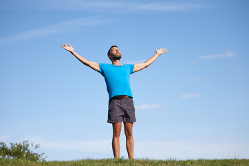 Park, hands up or man breathing for meditation, freedom or holistic health with calm soul....