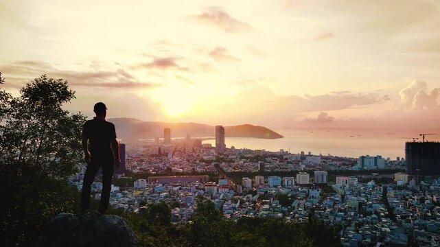 Quy Nhon, Vietnam - Person Overlooking City at Sunset