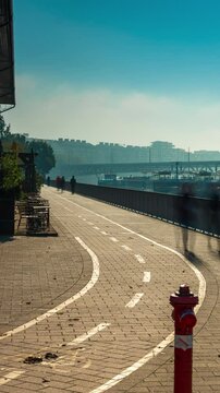 Budapest, Hungary - October 10, 2024: Budapest&rsquo;s Pathways Along the Danube Near Balna, foggy morning. Timelapse, zoom out transition, vertical orientation.