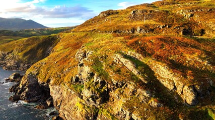 Beautiful Ireland - Enjoy the breathtaking view of a stunning coastal landscape with rocky cliffs and serene waters