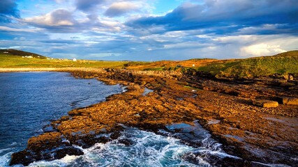 Muckcross Head Donegal Ireland - The breathtaking beauty of the stunning seascape at sunset, with its dramatic clouds, captivates