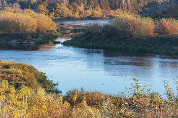 Autumn colour evening landscape with a view of Daugava river in Latvia