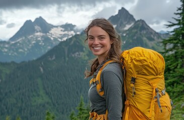 Woman with brown hair enjoying a hike in the stunning mountain landscape with a yellow backpack