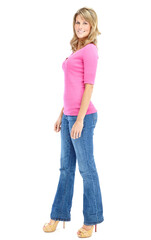 Fototapeta premium Smile, fashion and portrait of woman in studio with casual, colorful and trendy outfit for confidence. Happy, high heels and female person from Germany with pink tshirt for style by white background.