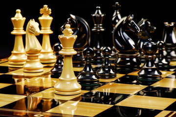 Elegant luxury white and black chess pieces on a chessboard. Concept of board games and development of logic.