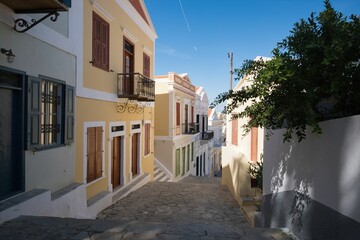 Fototapeta premium Mediterranean village street with colorful buildings.