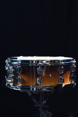 Drum close-up. Drum on a black background. Copy space.