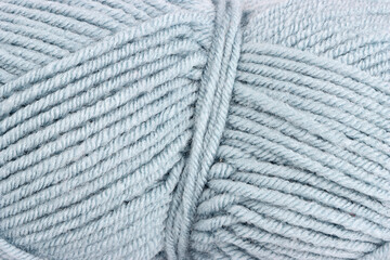 Close-up of the threads of a rolled ball of yarn