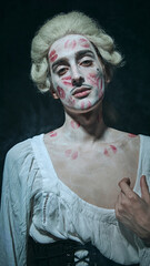 Modern aristocracy. nobleman with white powdered hair exudes confidence, kissed with bold lipstick...