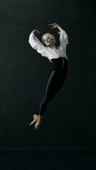 Ballet dancer shows off his precision and elegance, blending vintage with powerful modern, Graceful...