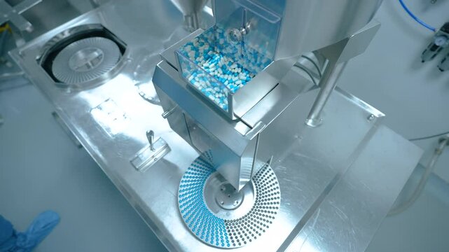 capsule pill factory process in a pharma factory. Pharmaceutical manufacturing tablet pill production line. medicine drug tablets capsule on medical equipment. pharma making process. Pharma concept