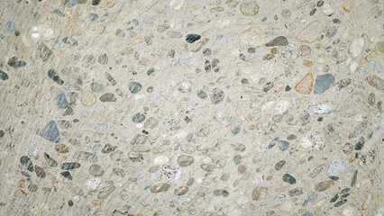 Pebble Embedded Wall and Floor, Textured Cement Surface