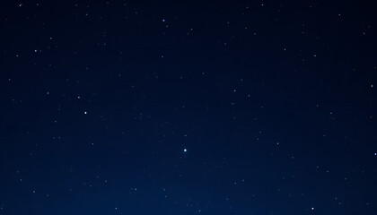 Fototapeta premium Starry night sky filled with twinkling stars on a dark blue background