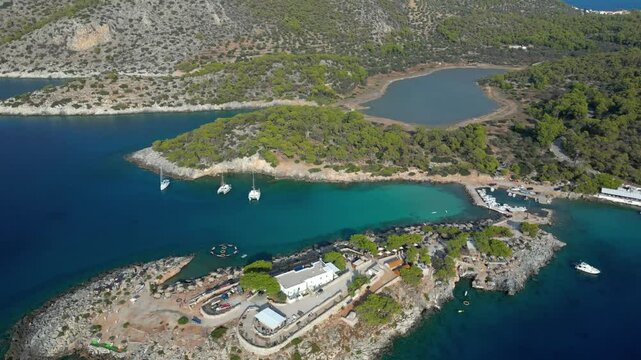 Aerial drone flight over stunning peninsula on Greek island