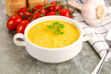 Vegetarian corn cream soup served parsley