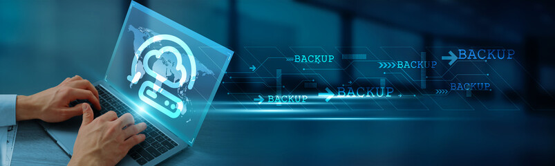 Hand holding laptop with global network connection on cloud, servers, data centers, blockchain, and...