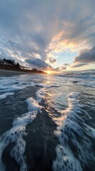 Serene Beach with Crashing Waves at Sunset