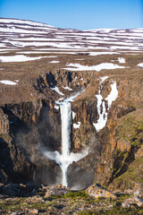 Waterfall and rainbow on the Hikikal River, Putorana Plateau. Russia, Siberia