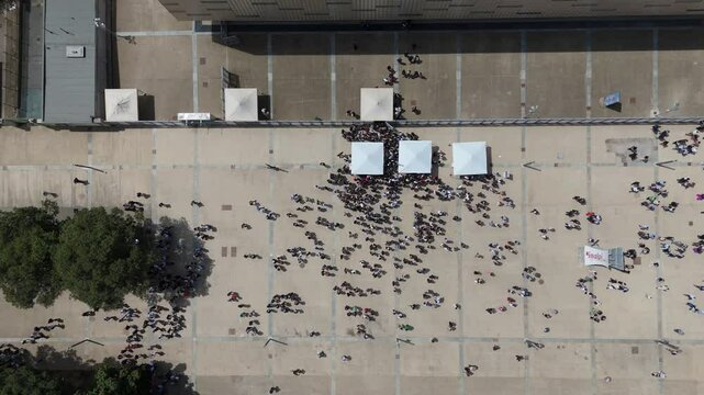 Aerial top down of crowd gathering near Palasport olimpico Inalpi Arena in Turin city Italy sold out ticket sport event