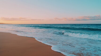 Fototapeta premium Serene sunset at the beach a tranquil evening by the ocean with gentle waves and soft sands