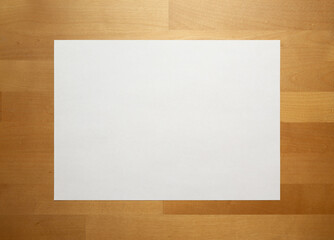 Plain white A4 paper on wood background