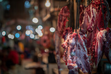Raw beef sold by traders in traditional markets, some of the meat is hung using a rope to attract buyers