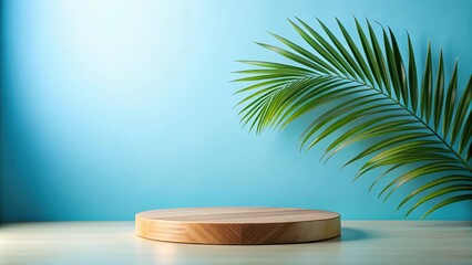 Obraz premium Wooden podium with palm leaf in forced perspective on blue background