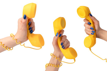 Yellow handset in woman hand isolated on white. Copy space.