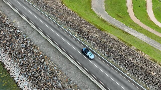 car travelling along the lake eildon victoria australia. yarra valley