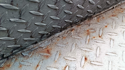 Metal plate with a pattern of diamonds