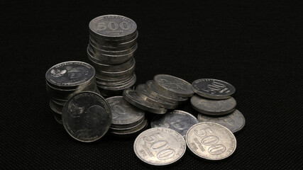 Stack of Indonesian coins isolated