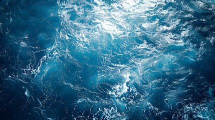Fototapeta premium Stunning Aerial View of the Deep Blue Ocean with Captivating Waves and Crystal Clear Waters