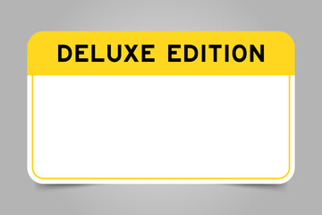 Label banner that have yellow headline with word deluxe edition and white copy space, on gray background