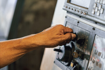 Industrial worker indoors in old factory. Industrial man Engineers in Hard Hats.Work at the Heavy Industry Manufacturing Factory.