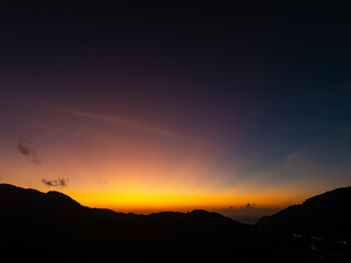 Sunset sky, Nature beautiful Light Sunset or sunrise over mountains,Colorful dramatic majestic scenery sky,Amazing clouds in sunset sky nature light cloud background