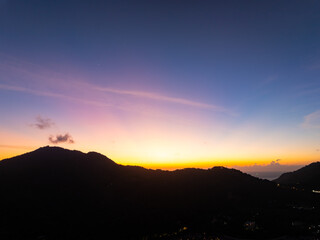 Obraz premium Sunset sky, Nature beautiful Light Sunset or sunrise over mountains,Colorful dramatic majestic scenery sky,Amazing clouds in sunset sky nature light cloud background