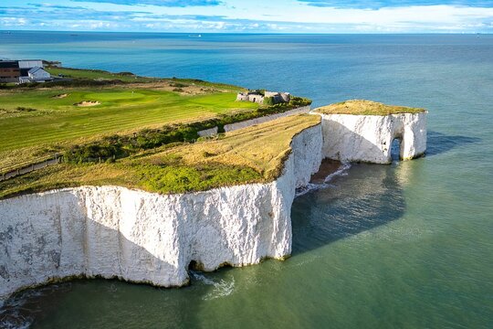 White chalk cliffs and golf course at Kingsgate Bay, Kent.