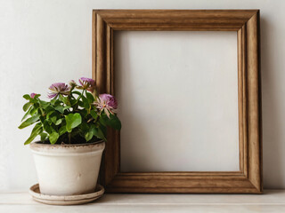 Fototapeta premium A wooden picture frame adorned with plants.
