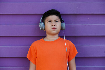 child listening to music