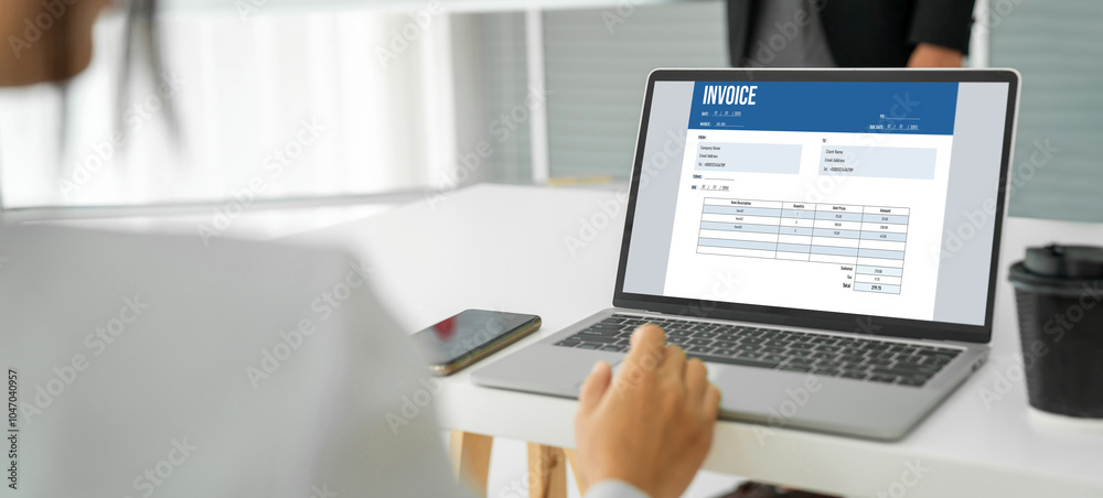 Poster invoice on computer screen from accounting application. computer program for financial and budget of