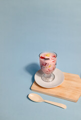 Es buah or Sop buah with fresh fruit filling and agar and cincau, mixed with syrup and ice cubes. suitable for hot weather, refreshment