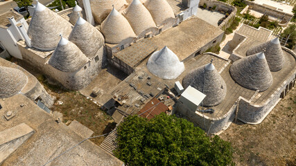 Aerial view of trulli in Puglia, Italy. They are ancient and traditional dwellings of the Apulian...