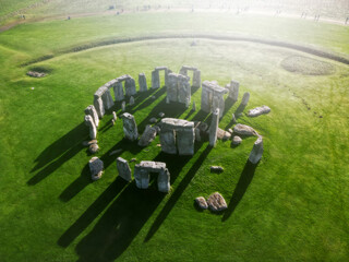 Drone view of Stonehenge and Wiltshire Countryside in England, UK. The stone circle dates to 3000 BC and is one of the best known ancient wonders of the world and UNESCO World Heritage Site.