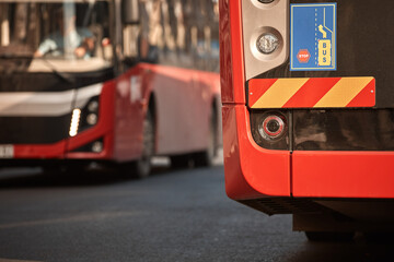 Naklejka premium Red bus for public transportation parked on a station.
