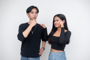 A young asian couple trying to think of ideas, trying to solve a problem. Isolated on a white background.