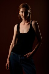 Studio portrait of a beautiful girl on a dark background