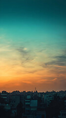 Obraz premium A panoramic view of a city skyline at sunset with a beautiful sky.