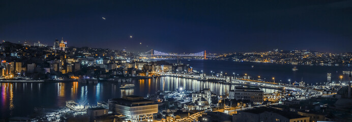 Night view of the Bosphorus Bridge. Photo of Istanbul illuminated from a high place. Panoramic view of Istanbul.