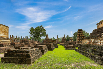 Ancient Buddha statue and ruin of temple of Wat mahathat temple in Sukhothai Historical Park, which also one of UNESCO Heritage Site